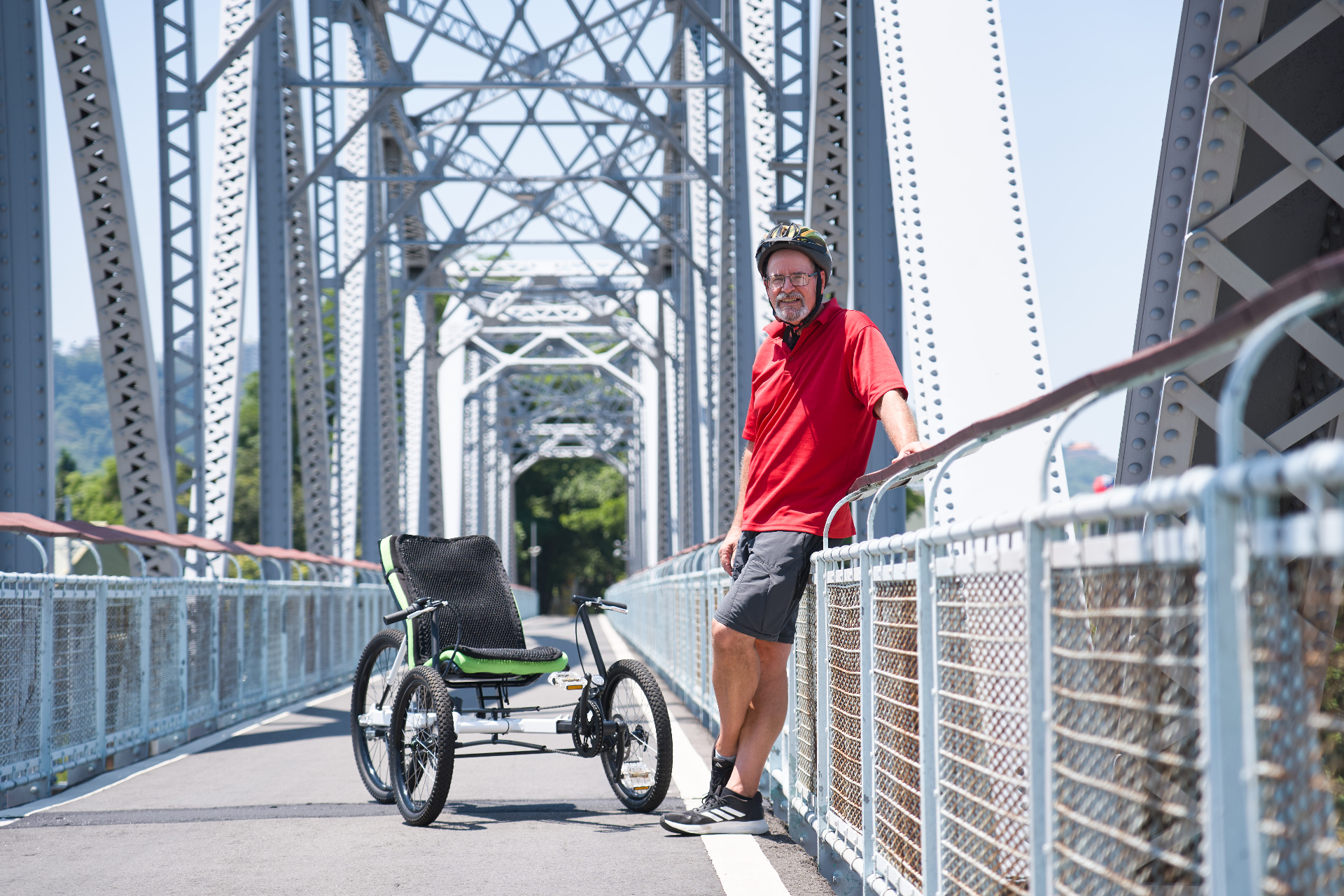 OVELOX trike on a bridge showing low step-through and stable frame